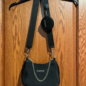Bebe black purse with attached coin holder new with no tags